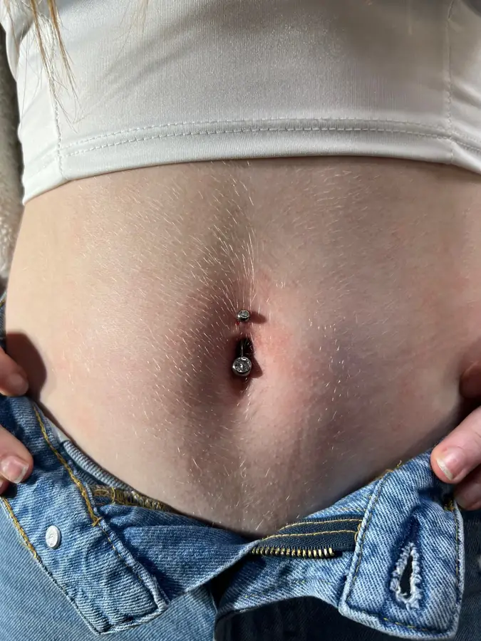 Ear lobe piercing by Katelyn at Work of Art Tattoo & Piercing in Las Vegas