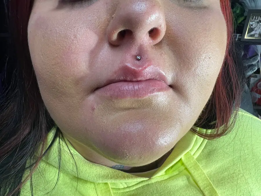 Lip and labret piercing by Katelyn at Work of Art Tattoo & Piercing in Las Vegas