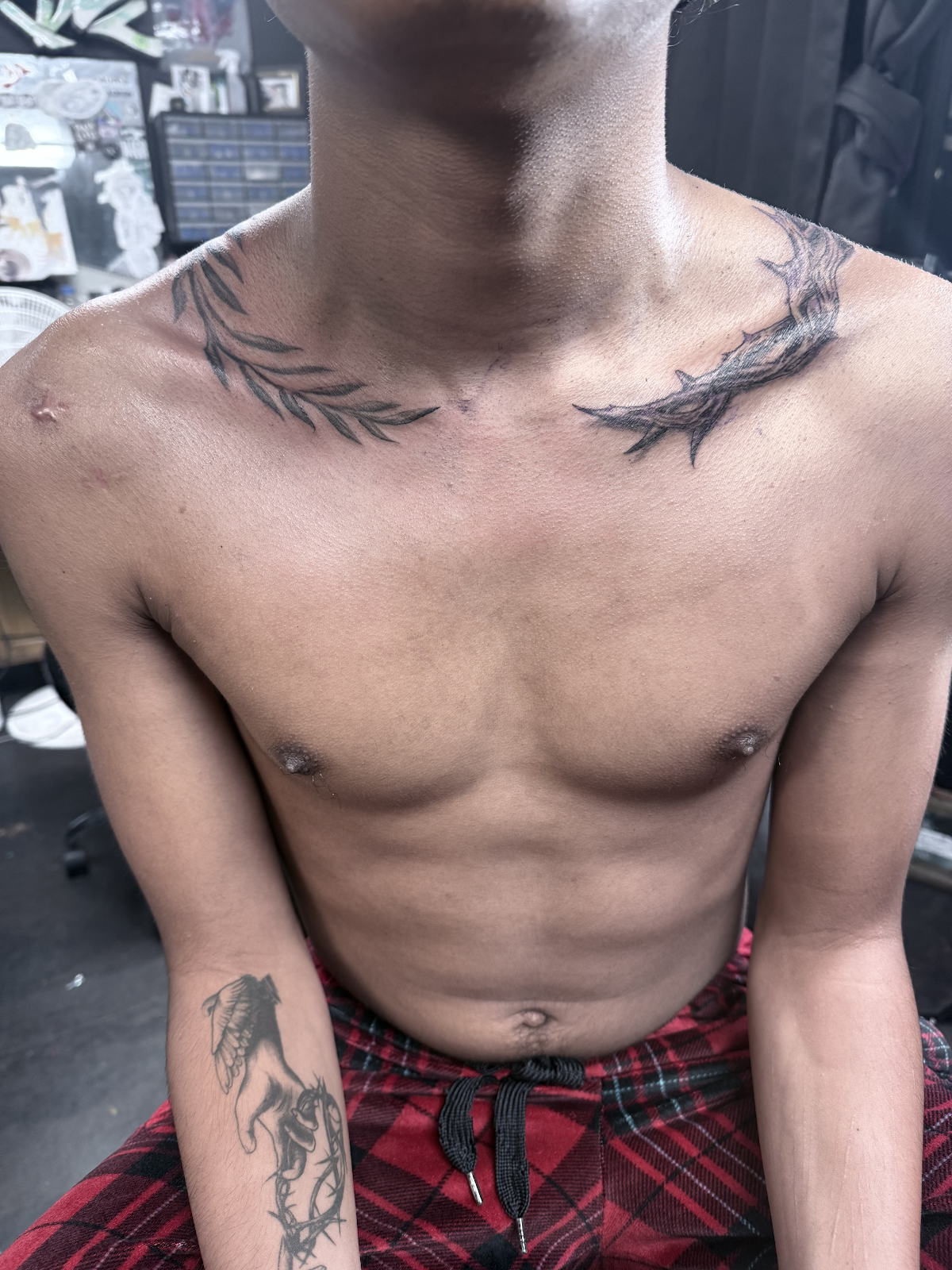 Black and grey collarbone thorns and wreath tattoo Las Vegas — Cover-Up Tattoos in Vegas at Work of Art Tattoo & Piercing, Las Vegas