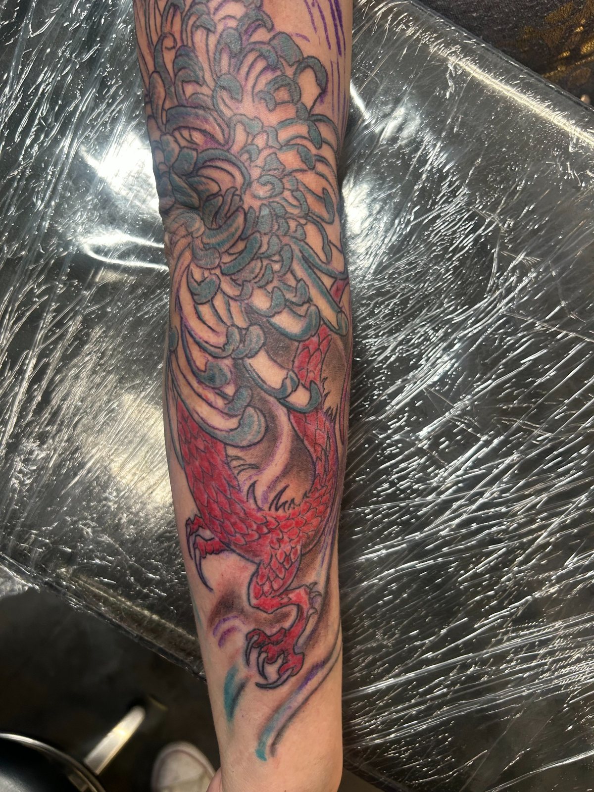 Color dragon tattoo redesign work by Joshua Cole