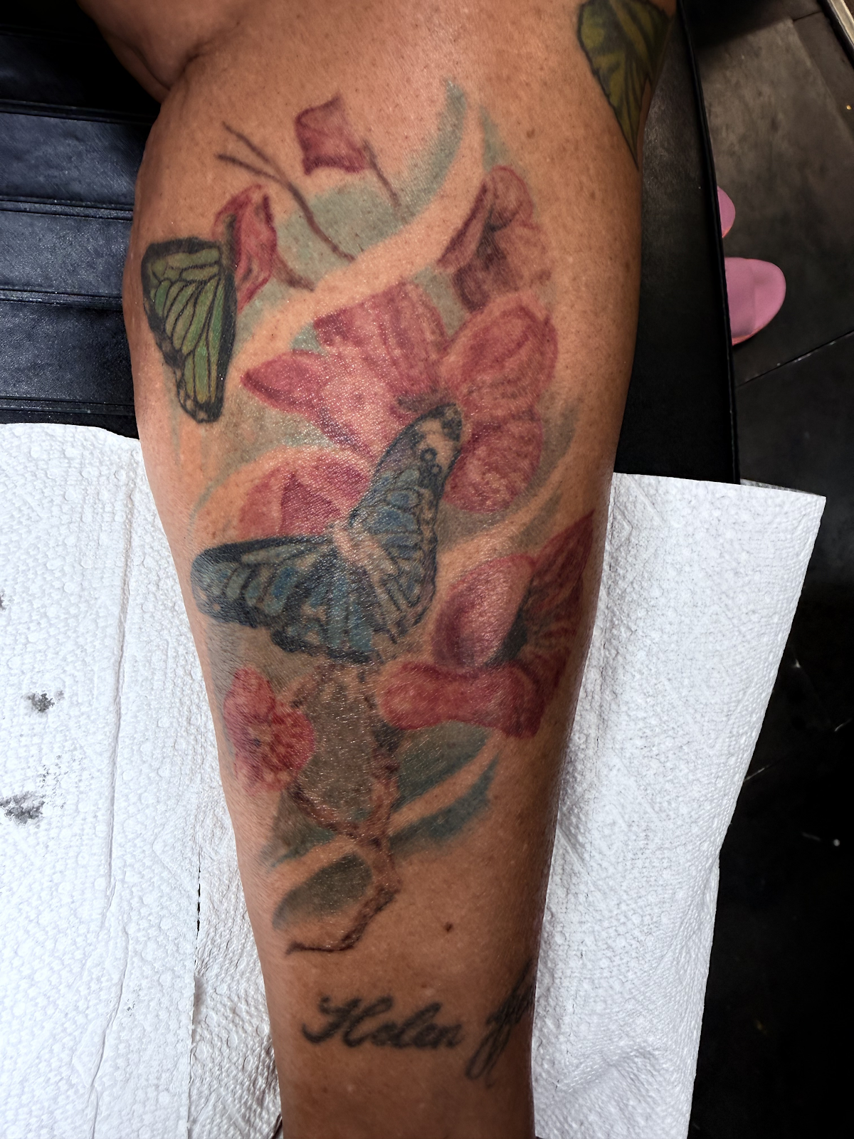 Consult photo — aged floral leg tattoo before cover-up consult, Las Vegas, Work of Art Tattoo & Piercing, Las Vegas