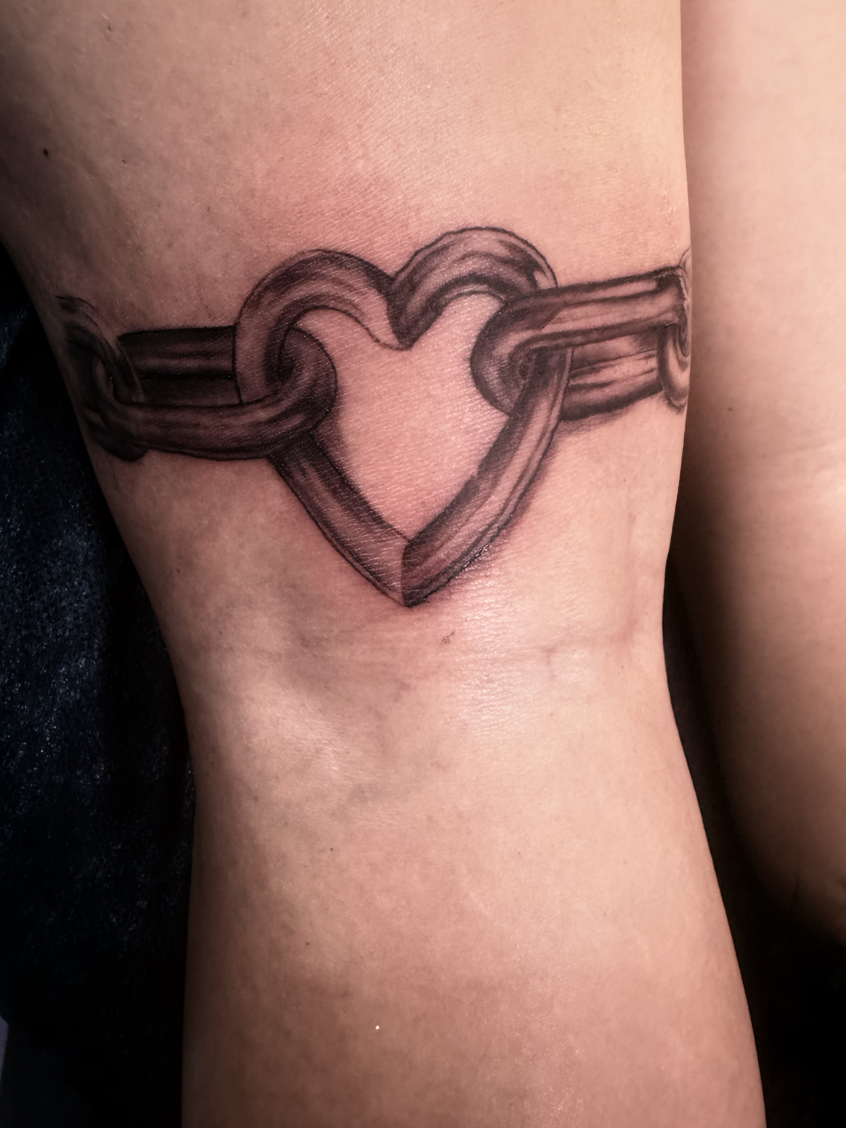 Healed Black and grey chain heart tattoo — Cover-Up Tattoos in Vegas, Work of Art Tattoo & Piercing, Las Vegas