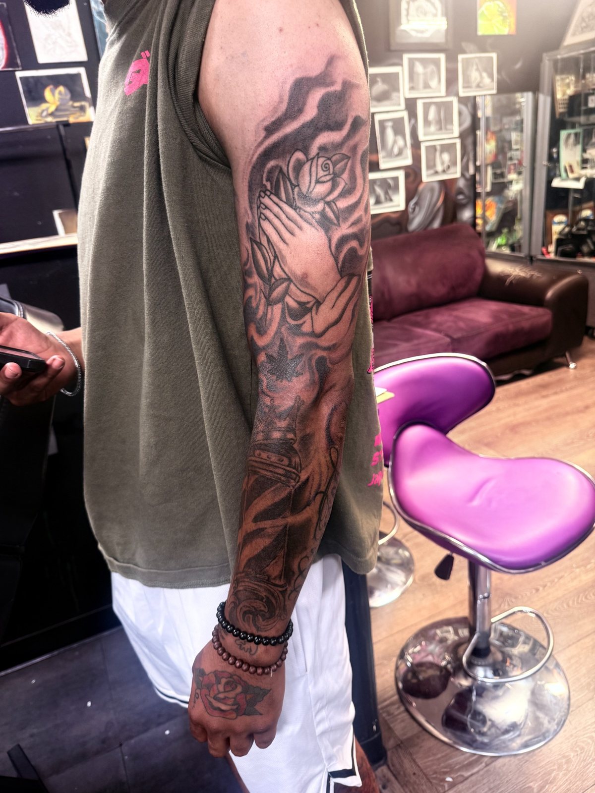 Large-scale arm rework by Joshua Cole at Work of Art Tattoo in Las Vegas