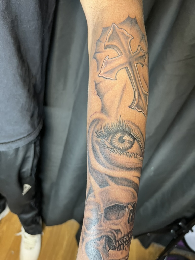 One-year healed cross eye skull inner forearm black and grey realism by Joshua Cole, Work of Art…, Work of Art Tattoo & Piercing, Las Vegas