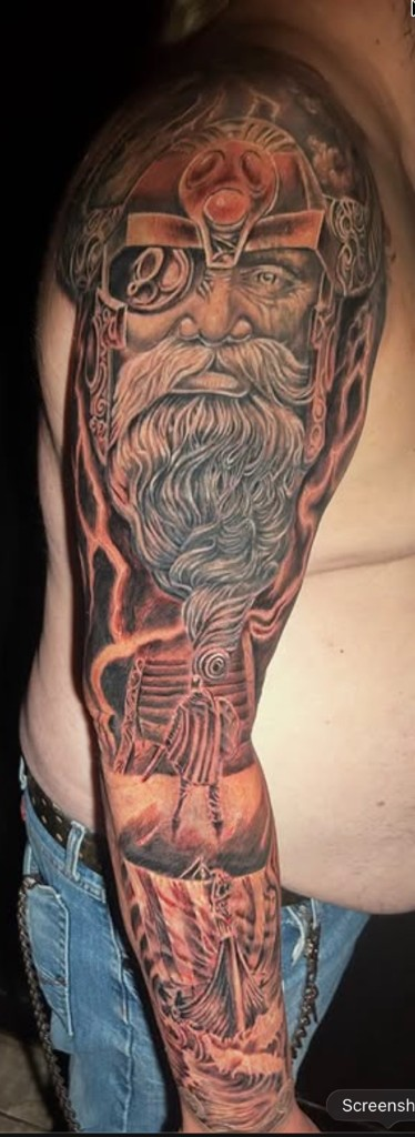 Black and grey Norse Odin and Viking ship sleeve — Work of Art Tattoo Las Vegas