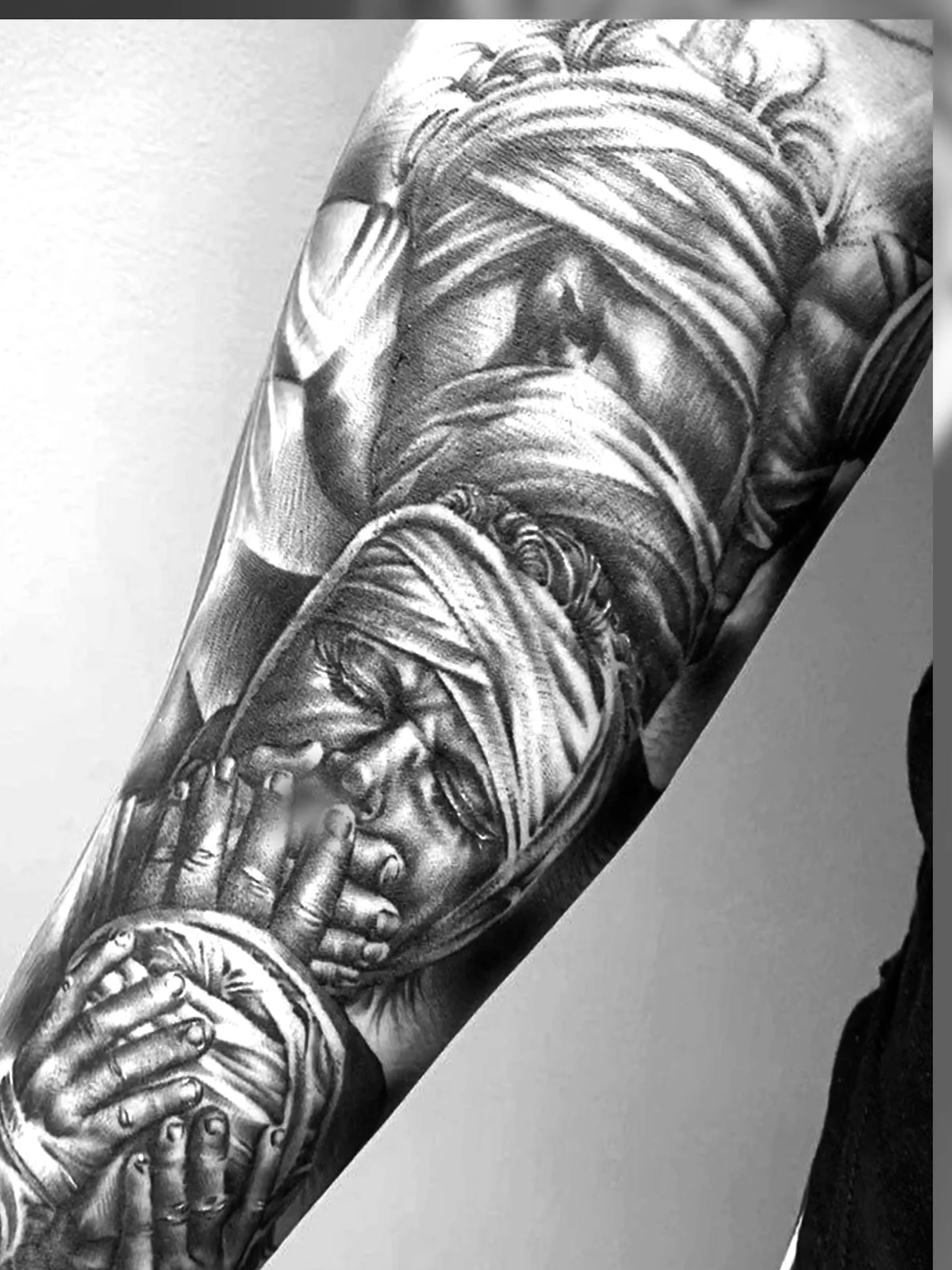 Black and grey skull hourglass forearm realism tattoo — Work of Art Tattoo Las Vegas