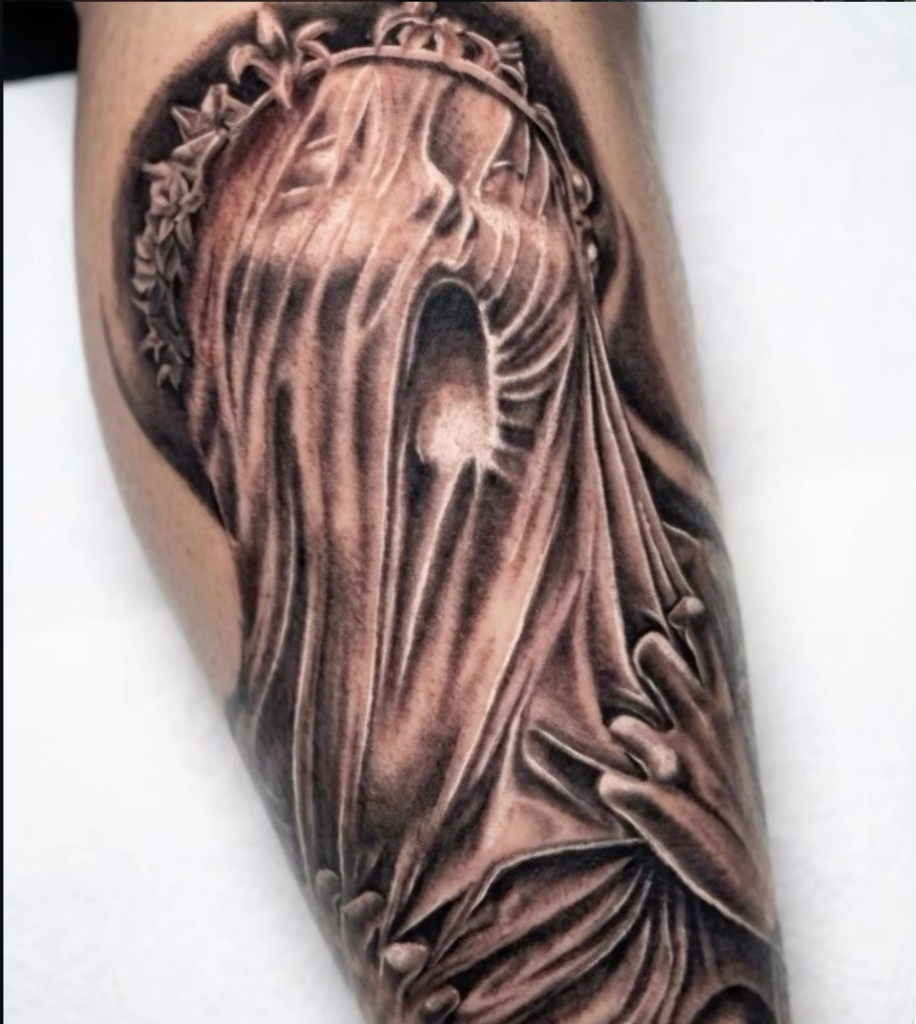 Veiled woman statue black and grey realism — Work of Art Tattoo Las Vegas