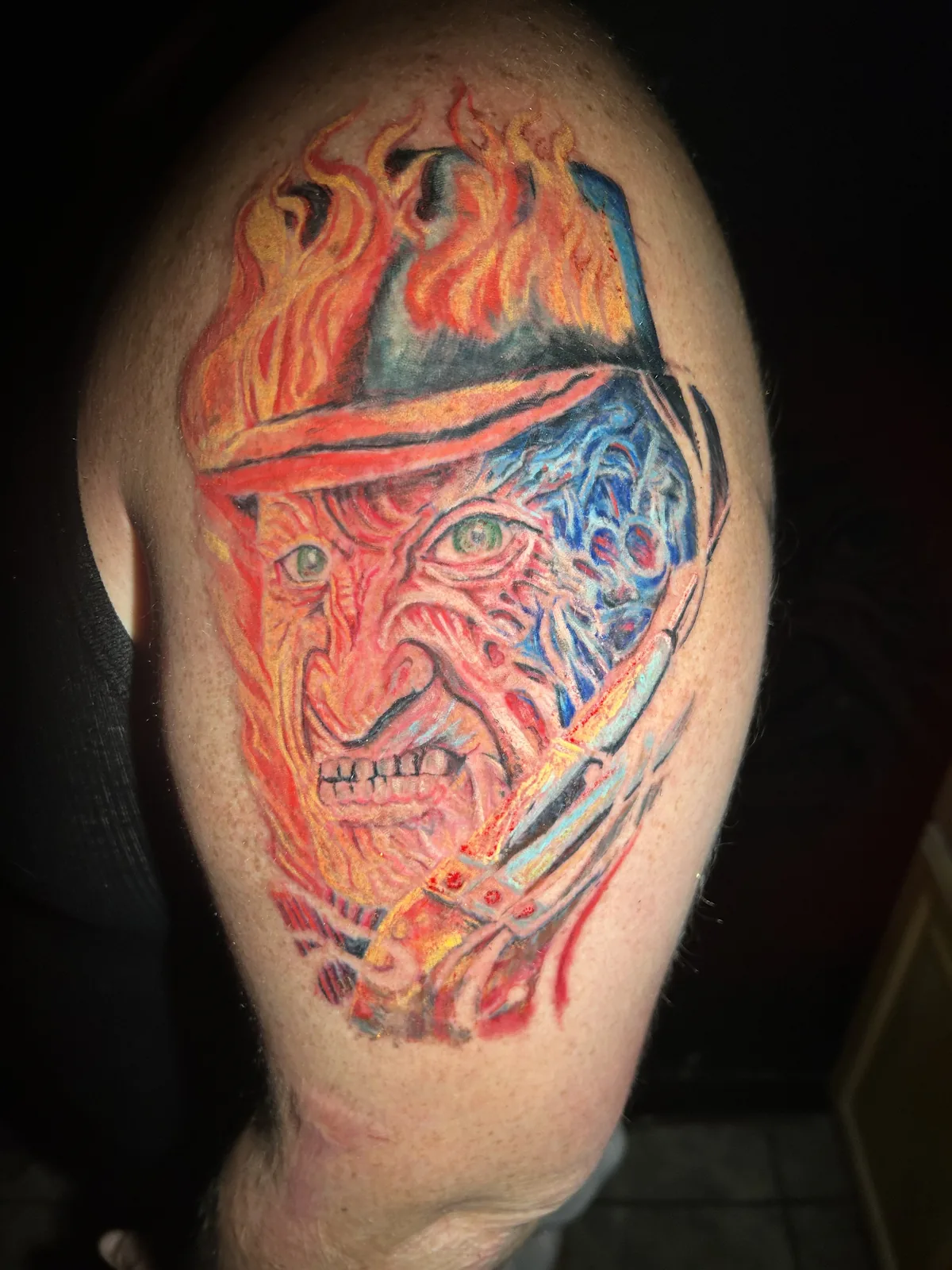 Black and grey realism forearm tattoo with woman portrait, skull, and skeletal hand — Work of Art Tattoo Las Vegas