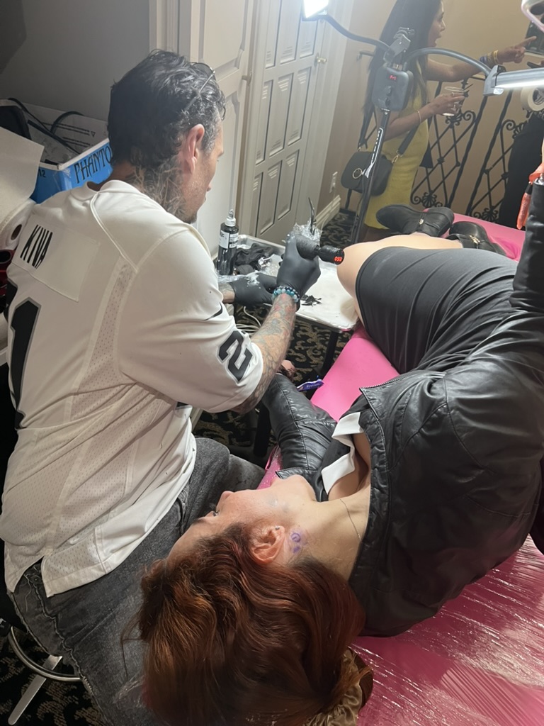 Small Bitcoin logo tattoo completed at private offsite event — Joshua Cole, Work of Art Las Vegas, Work of Art Tattoo & Piercing, Las Vegas